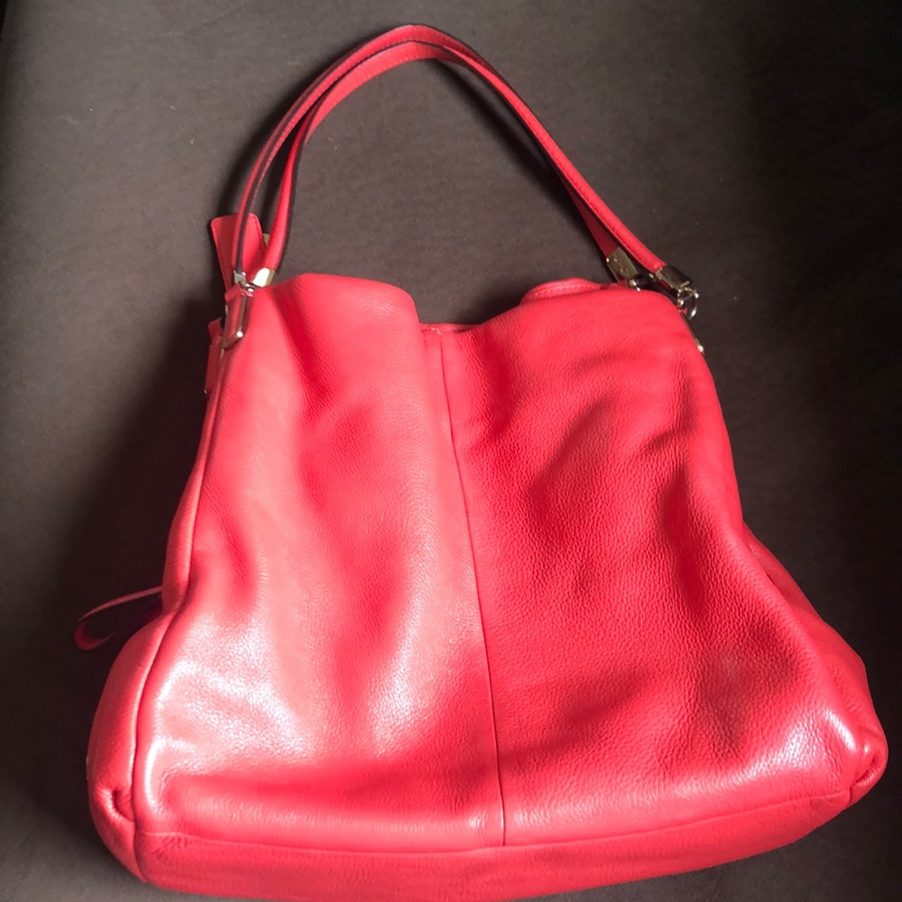 Coral colored Coach Purse